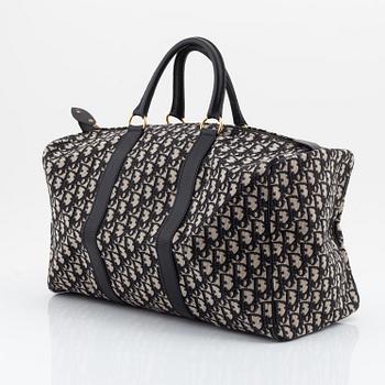 Christian Dior, weekendväska med paraply.