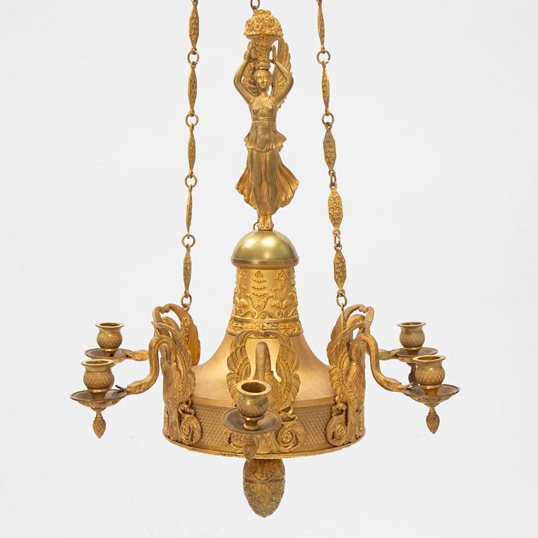 A presumably Italian Empire six-light ormolu chandelier, early 19th century.