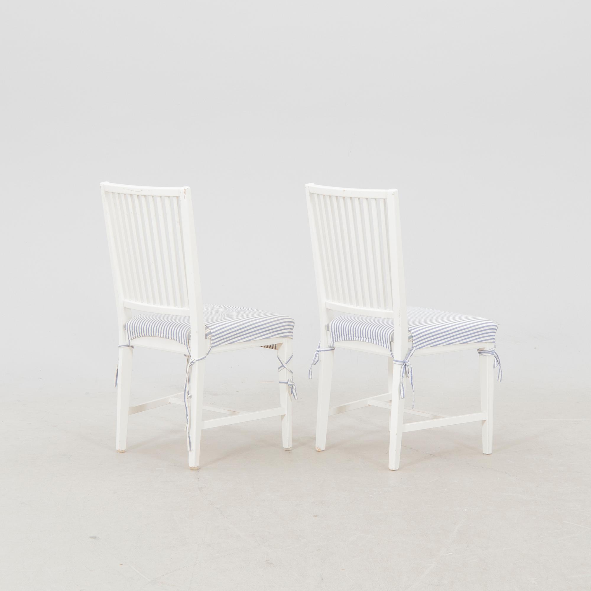 A set of 10 painted Gustavian style chairs from IKEA later part of the 20th century.