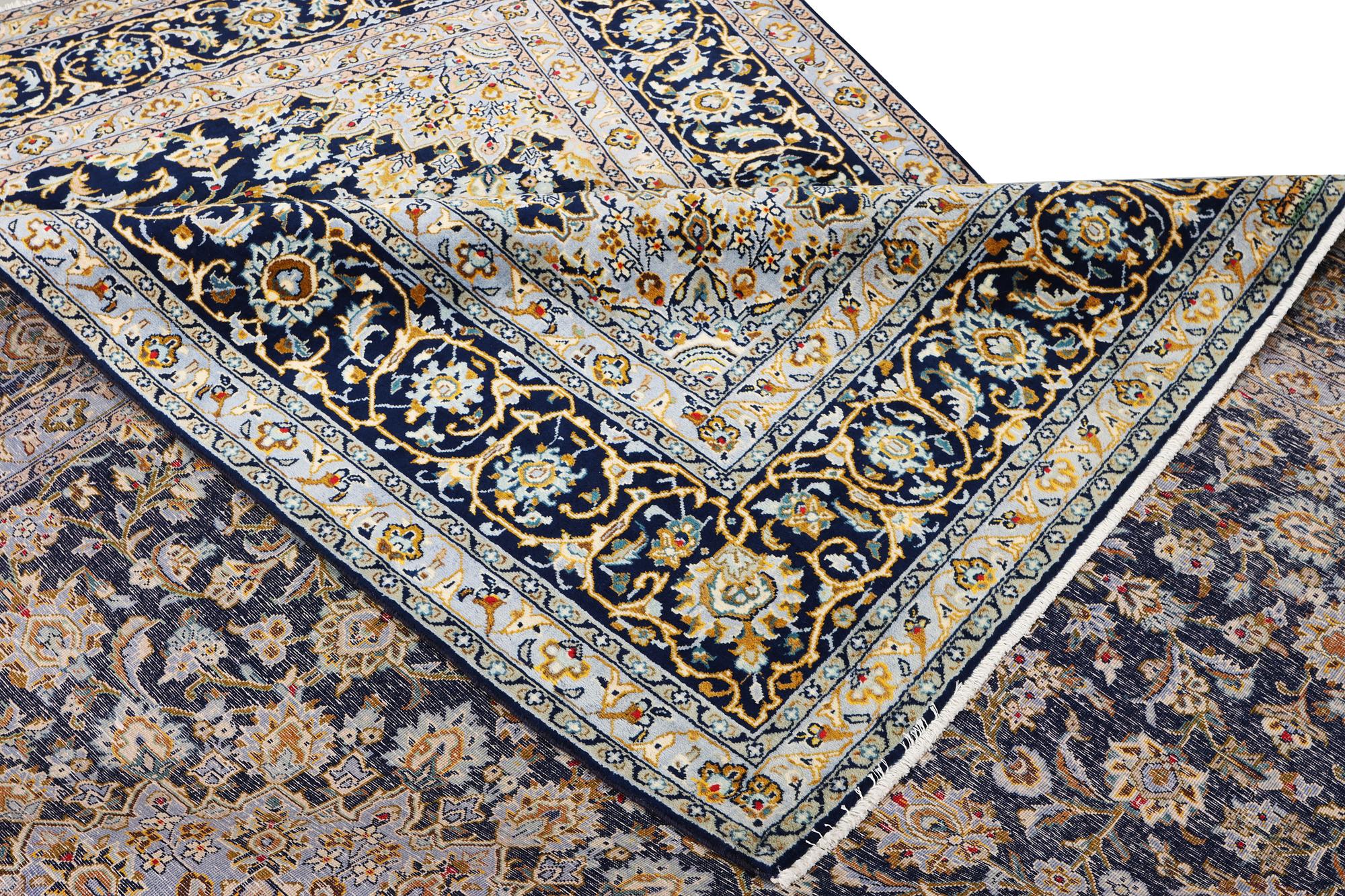 A Kashan carpet, c. 343 x 236 cm.