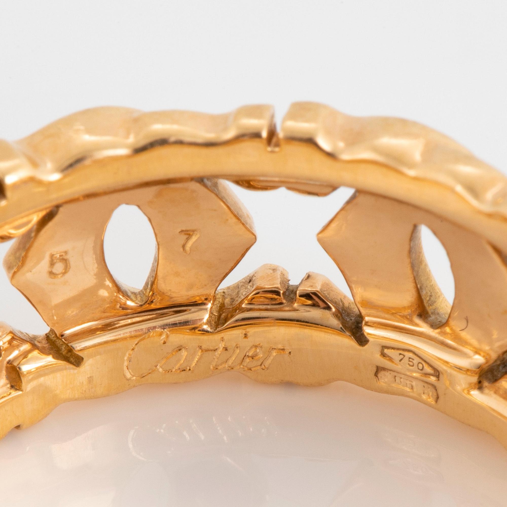 An 18K gold Cartier "Double C" ring.