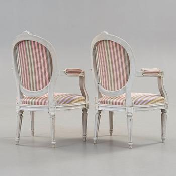 A pair of Gustavian late 18th century armchairs by Erik Öhrmark, master 1777.