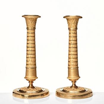 A pair of Empire candlesticks.