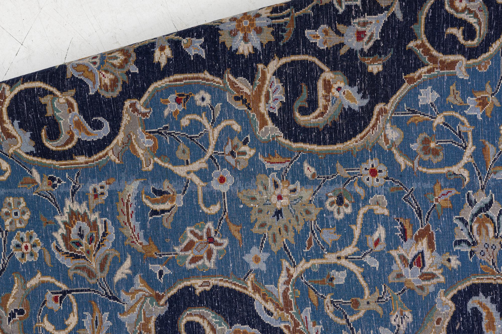 A Royal Keshan carpet, signed, c. 395 x 295 cm.