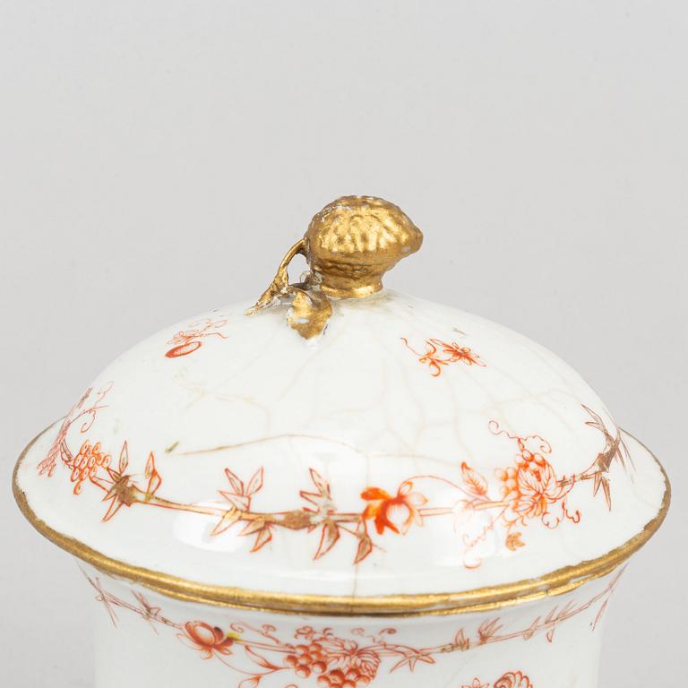 Nine orange and white export porcelain service, Qing dynasty, 18th-19th century.
