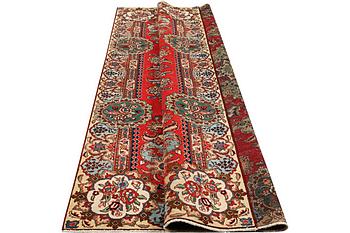 A carpet, Tabriz, c. 318 x 211 cm.