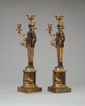 A pair of Swedish Empire early 19th century three-light candelabra.