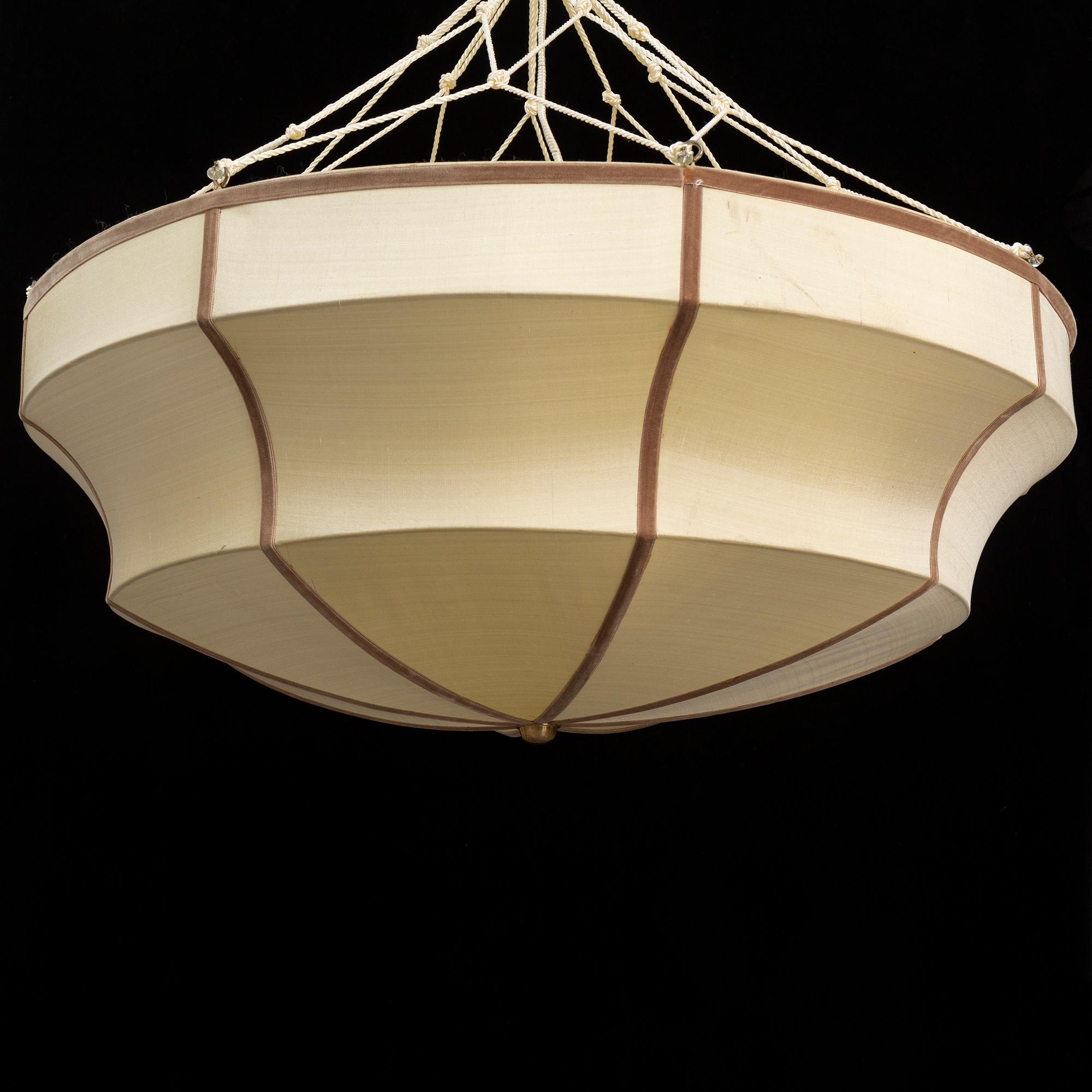 A pair of textile clad ceiling lights, 20th century.