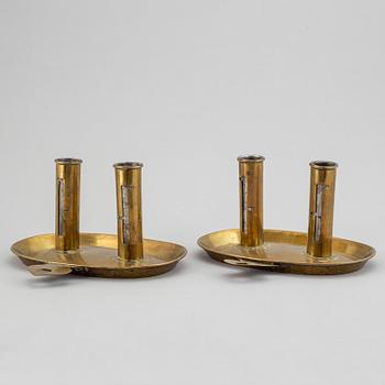 A pair of North European Brass double candelholders, 19th century.