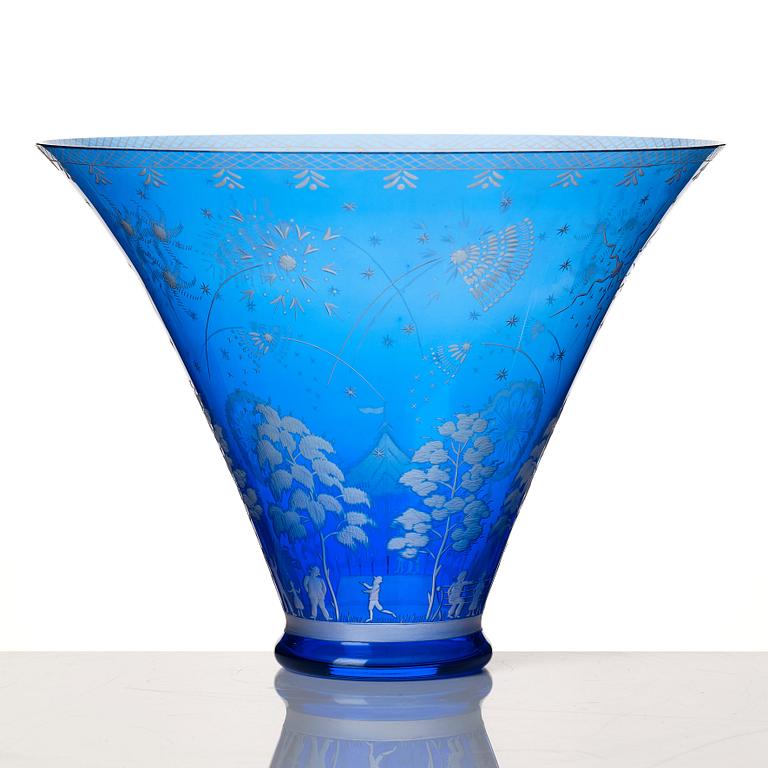 Edward Hald, an engraved blue glass "Fyrverkeriskålen" glass bowl, Orrefors 1957, engraved by Karl Rössler.