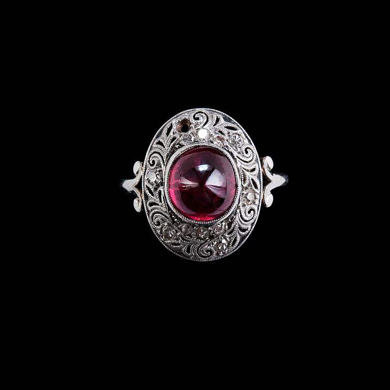 A RING, ruby, diamonds 0,06 ct.