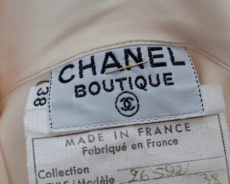 A Chanel silk blouse.