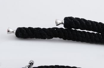 A bracelet, necklace and a clasp by Ole Lynggaard.