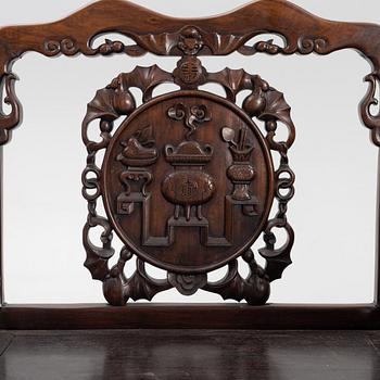 A pair of hardwood armchairs, China, late Qing dynasty/around 1900.