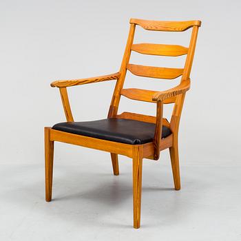 A "Vapensmeden" pine armchair by Carl Malmsten.