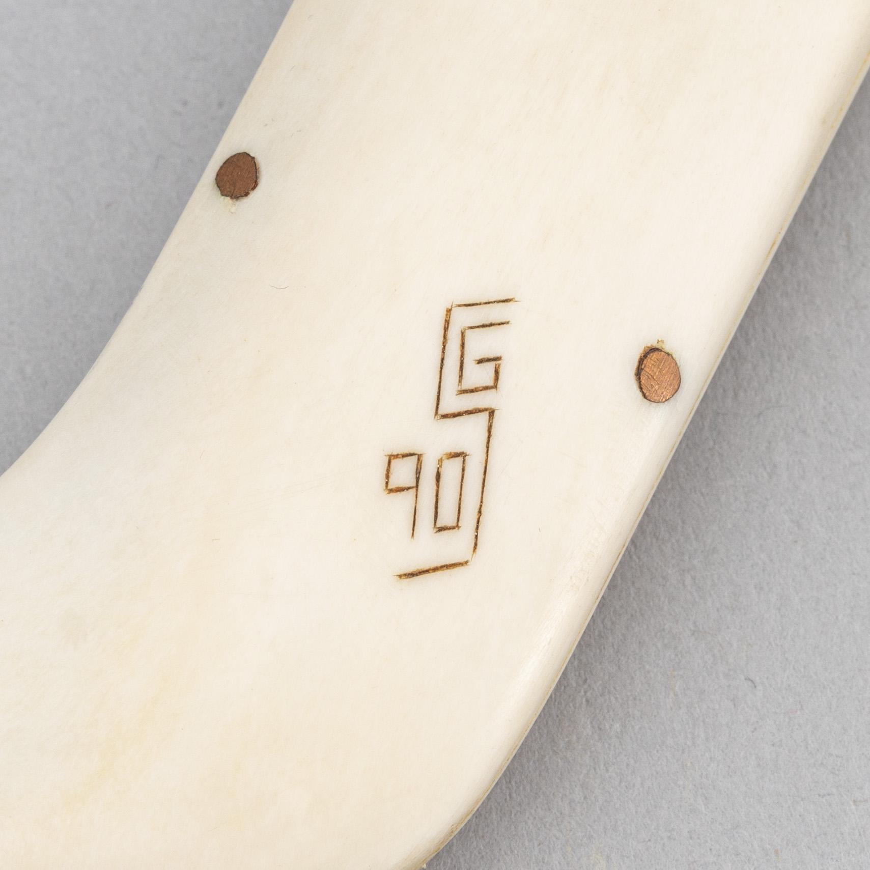 A Sami reindeer horn knife, signed SG/GS and dated 90.