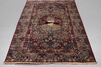 A carpet, semi-antique Kerman Laver, ca 242 x 142 cm.