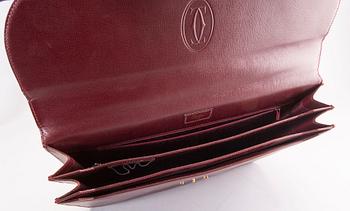 A Cartier leather briefcase.