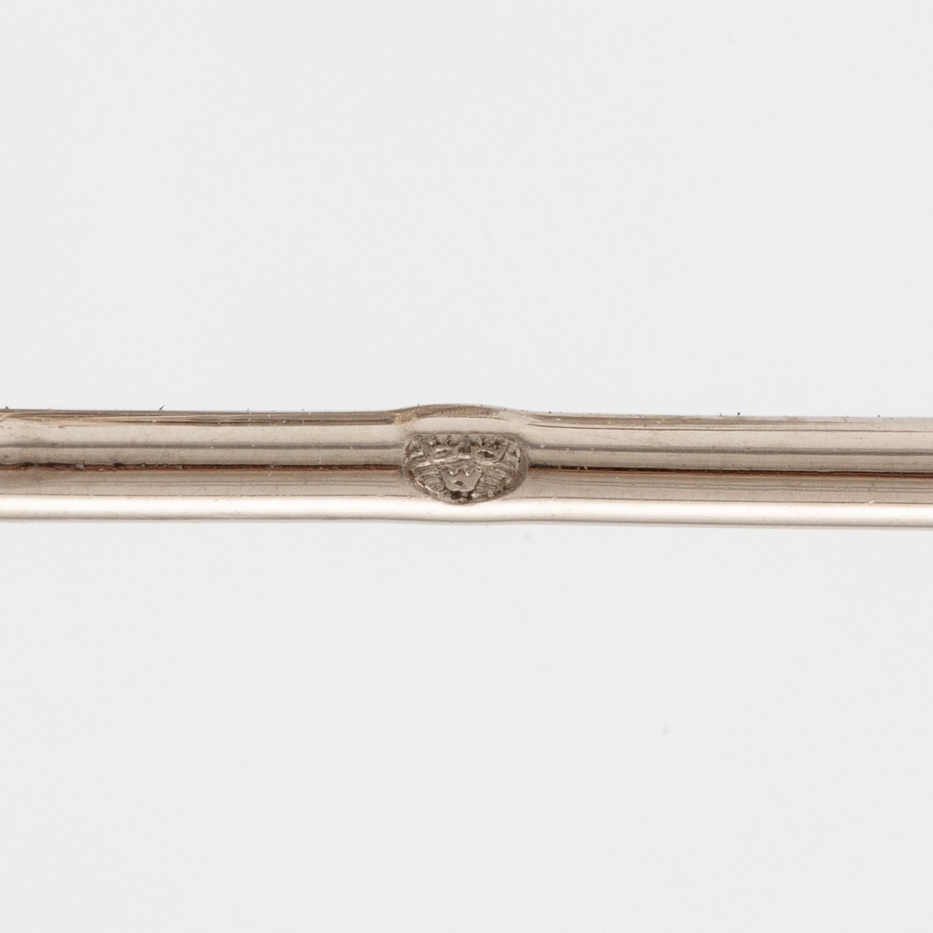 A brooch/double clip in platinum set with old- and eight cut diamonds.