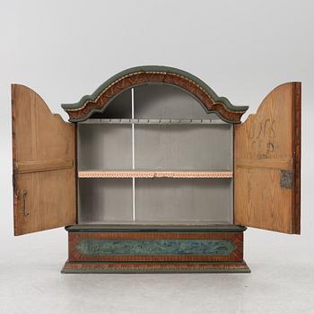 A folk-art cabinet from Värmland, Sweden, dated 1806.