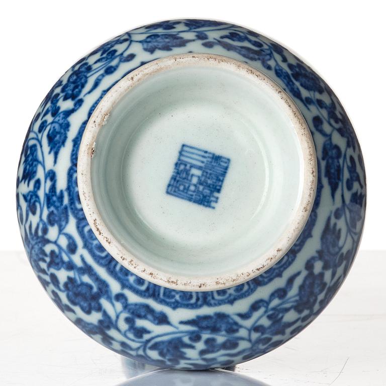 A blue and white gourd shaped lotus vase, presumably Chinese Republic with Qianlong mark.