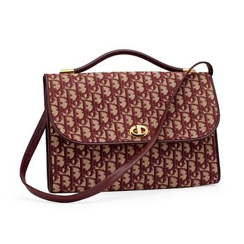 741. CHRISTIAN DIOR, a red monogram canvas shoulder bag.