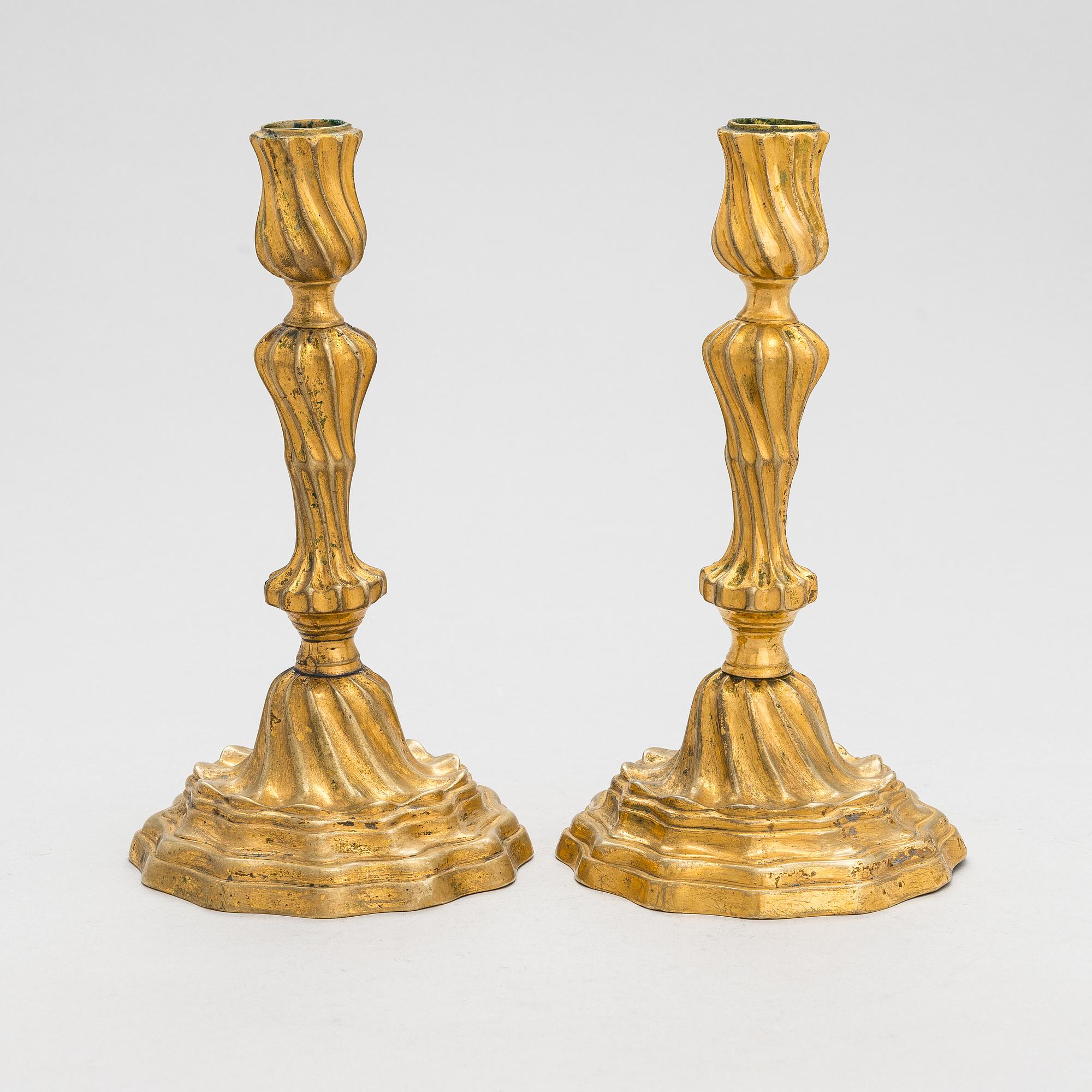 A pair of mid-18th century candlesticks France.