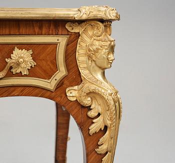 A Régence style, Ormolu - Mounted Bureau Plat, around year 1900.