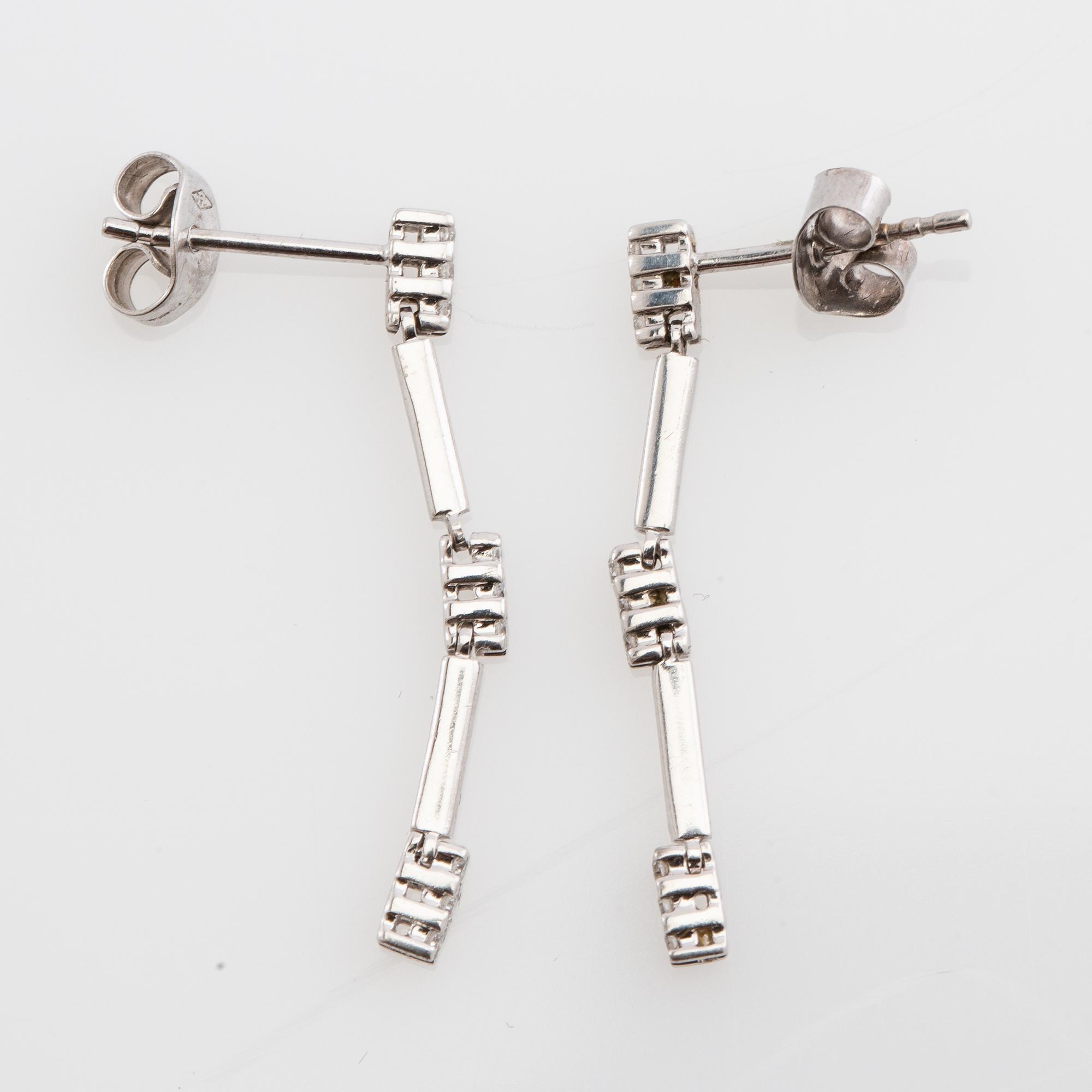 Earrings, a pair, 18k white gold with brilliant-cut diamonds.