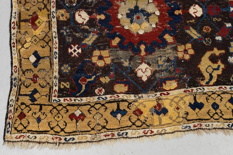 A carpet, fragment, an antique Karabagh 18th century, ca 293-300,5 x 202,5-205,5 cm.