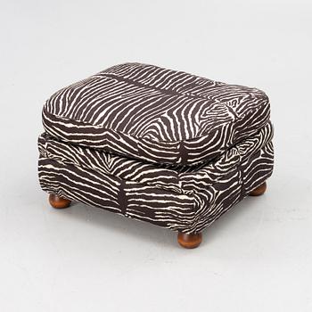 Josef Frank, a model 336 ottoman, Svenskt Tenn.