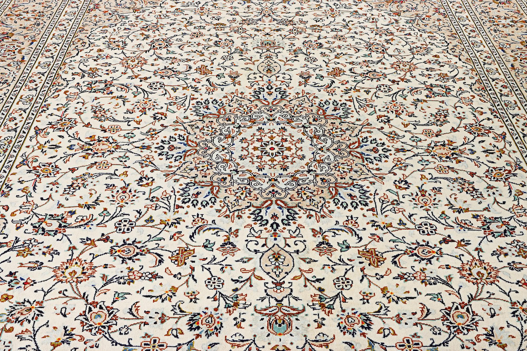 A Kashan carpet, c. 403 x 300 cm.