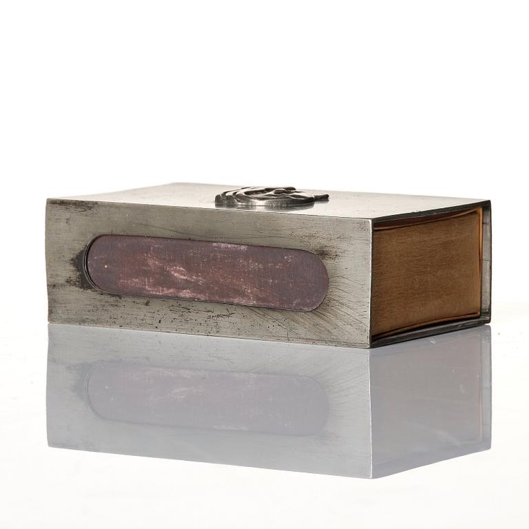 Firma Svenskt Tenn, a pewter matchbox case with beaker, models "38d" and "185a", with decor by Anna Petrus, Stockholm 1927-28.