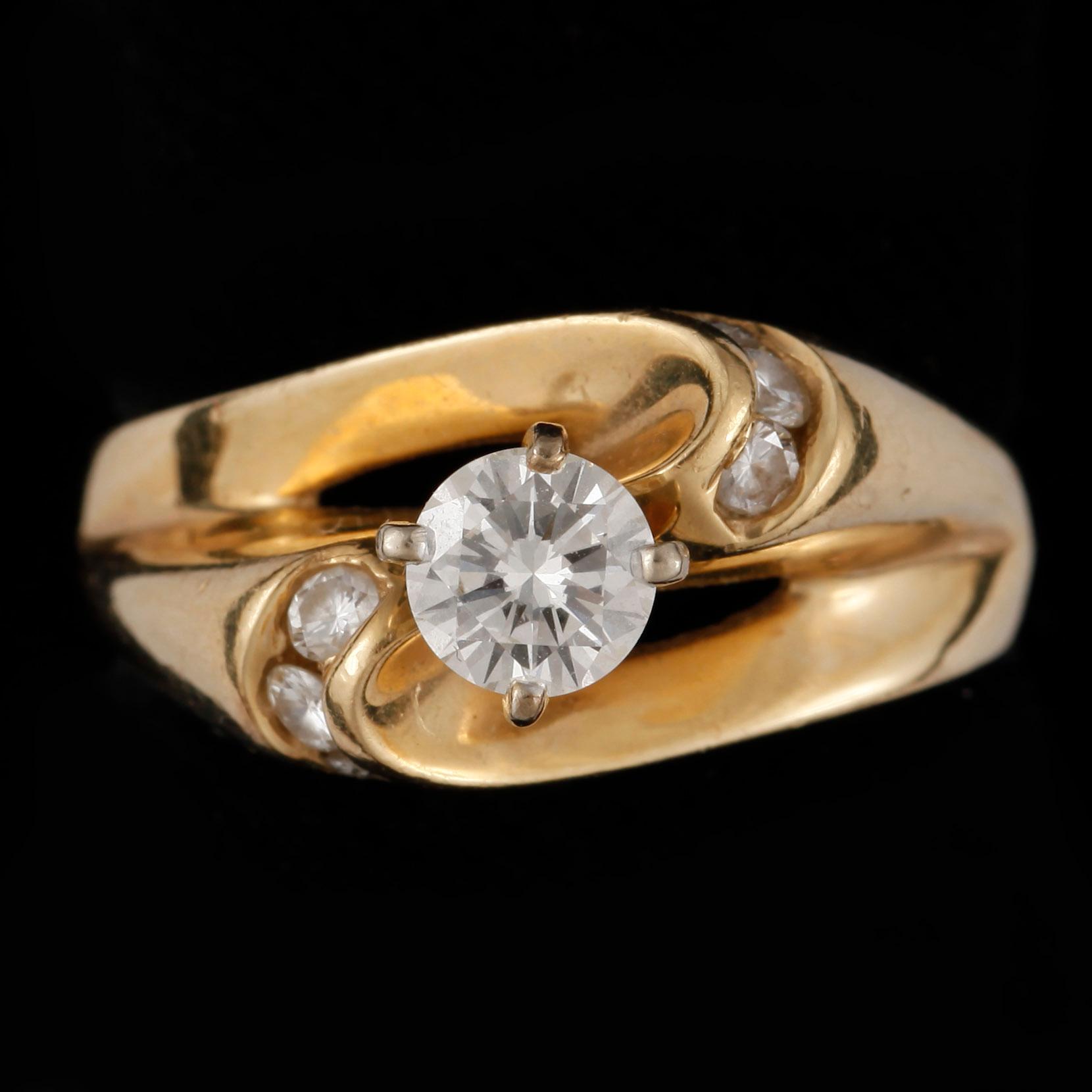 RING, 14k guld med briljantslipade diamanter, tot ca 0,5 ct. Vikt ca 6,5 gram.