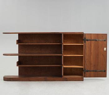 Axel Einar Hjorth, An Axel Einar Hjorth 'Lovö' stained pine bookshelf, Nordiska Kompaniet Sweden 1930's.