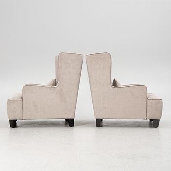 A pair of easy chairs, 21st century.