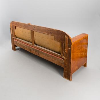 An 1820s Empire style sofa.