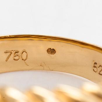 Cartier, an 18K gold ring.