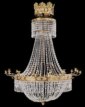 585. A Swedish Empire 1820/30's sixteen-light chandelier.