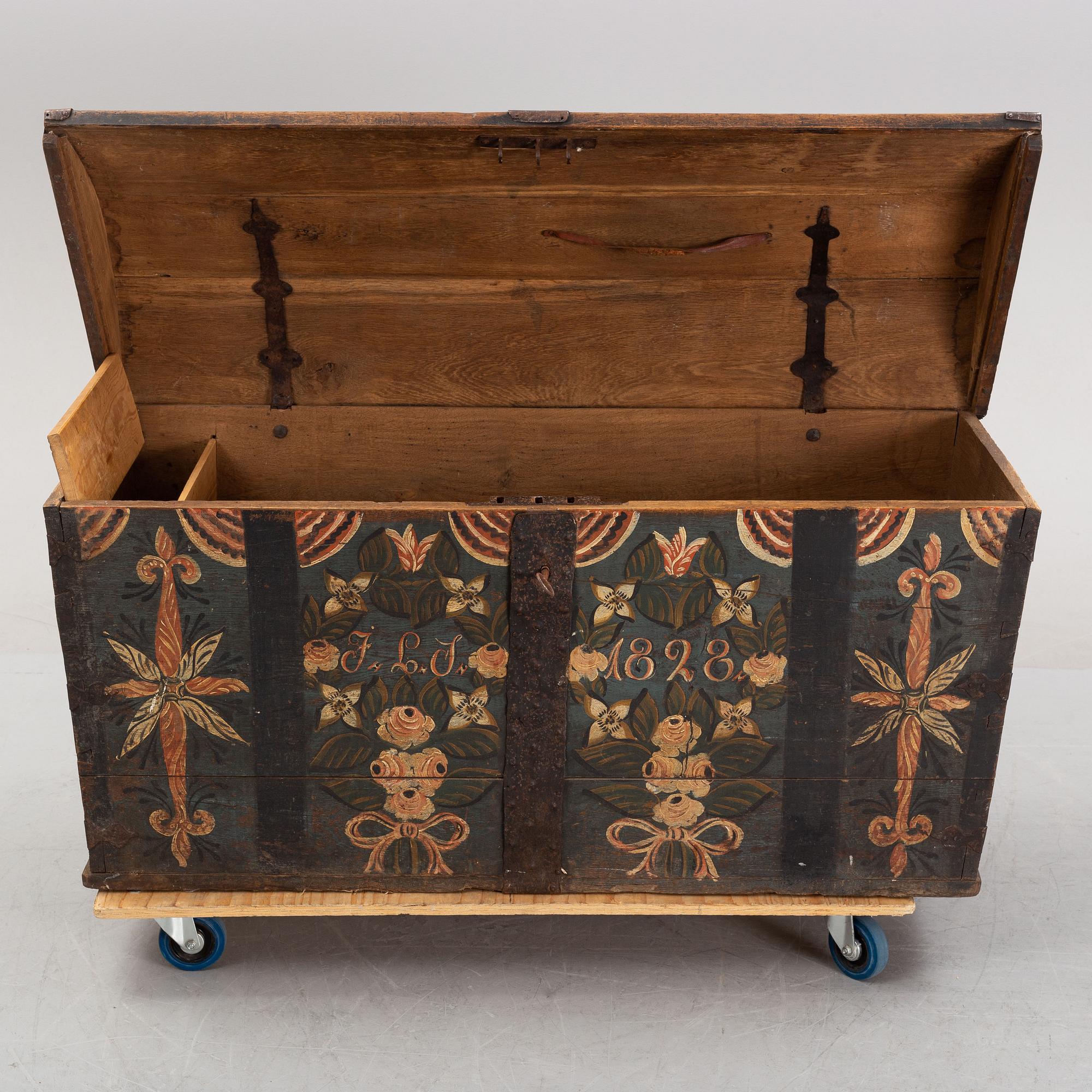 A swedish provincial oak chest, dated 1928.