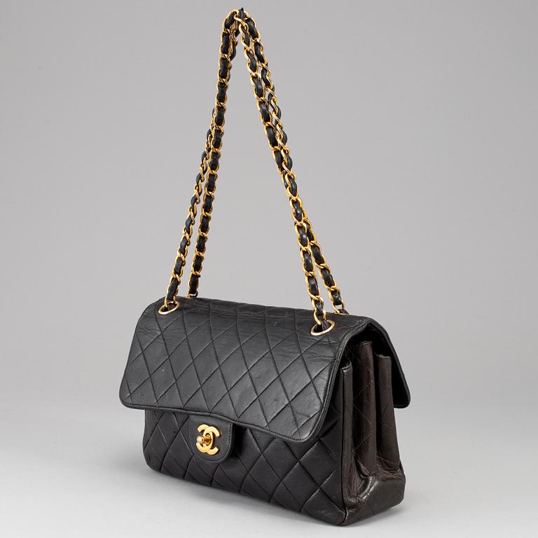 CHANEL, 'Double sided flap bag'.
