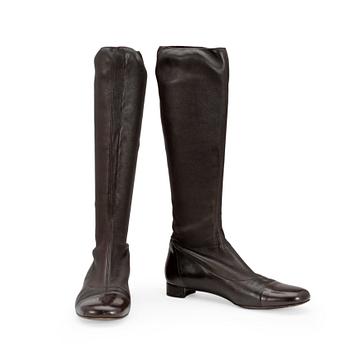 500. CHANEL a pair of brown leather boots.