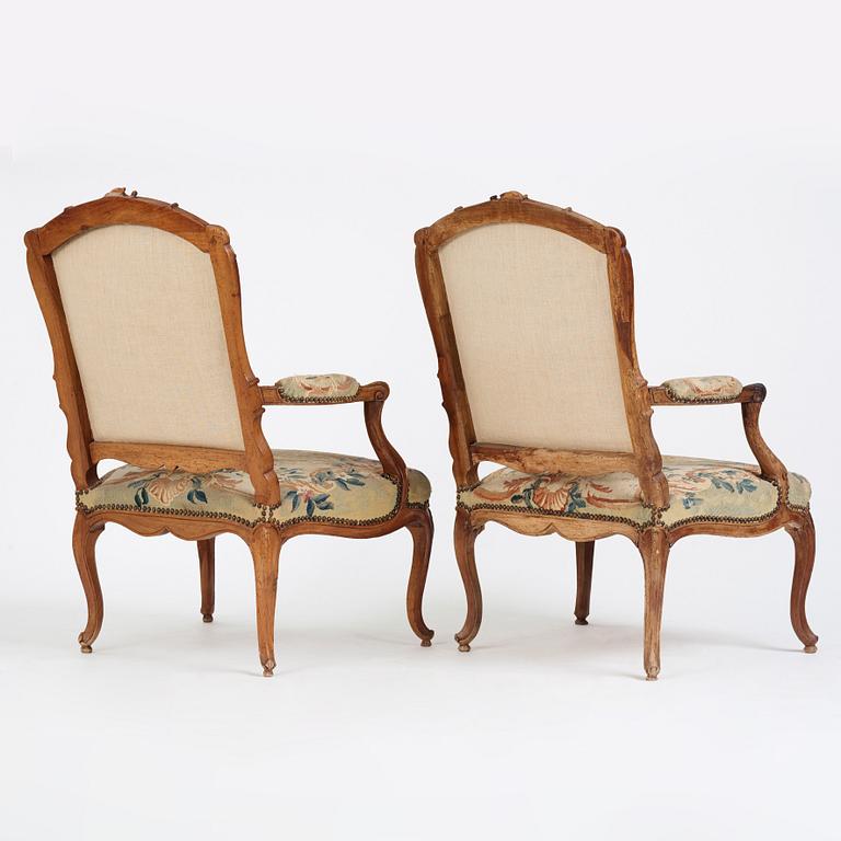 A pair of Louis XV armchairs.