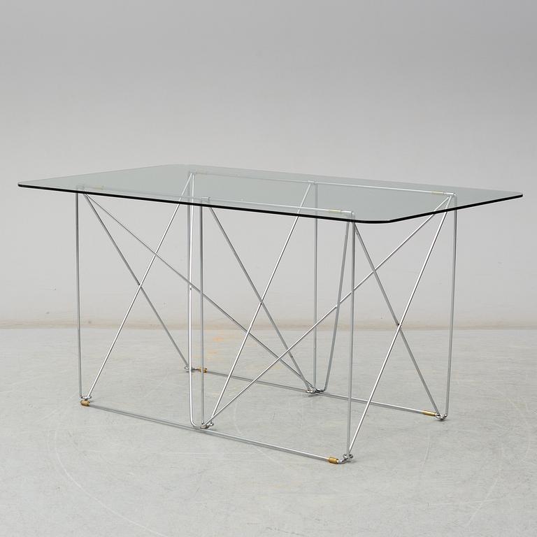 A glass dining table by IKEA.