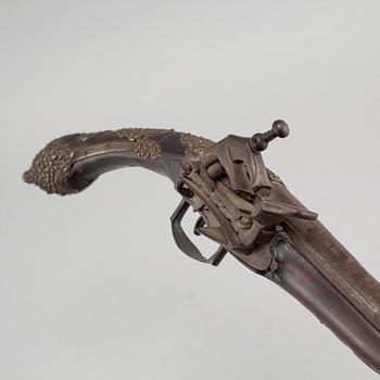 A mid 19th century miquelet lock pistol.