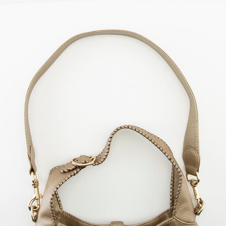 Gucci,.