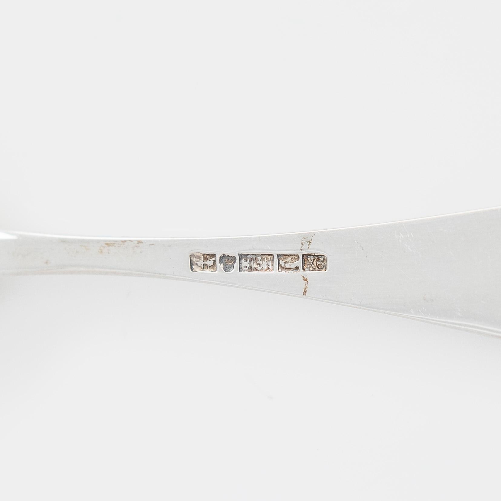 Sugar bowl and cream jug, and four pieces of silver cutlery, Vyborg, Turku, Hämeenlinna and Helsinki 1926-60.