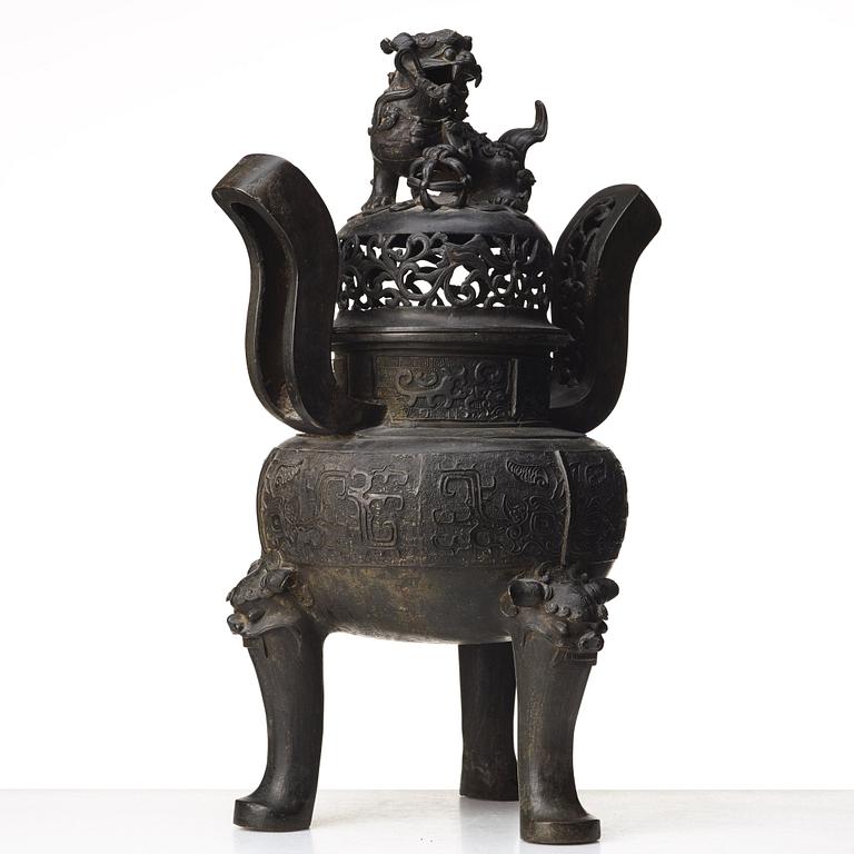 A large bronze censer with cover, presumably late Ming dynasty (1368-1644).