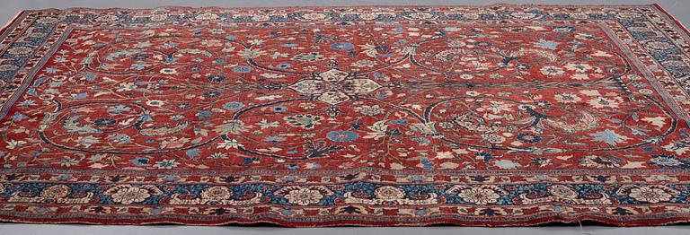 A carpet, semi-antique Tabriz, ca 359-364 x 259 cm.