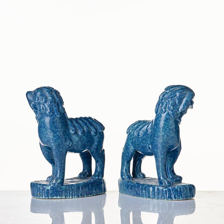 A pair of robbins egg glazed buddhist lions, Qing dynasty, 19th Century.